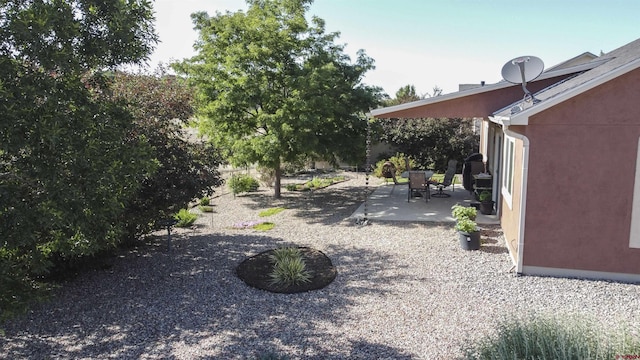 521 Alta Lakes Ave, Montrose, CO 81403 - view of yard featuring a patio area