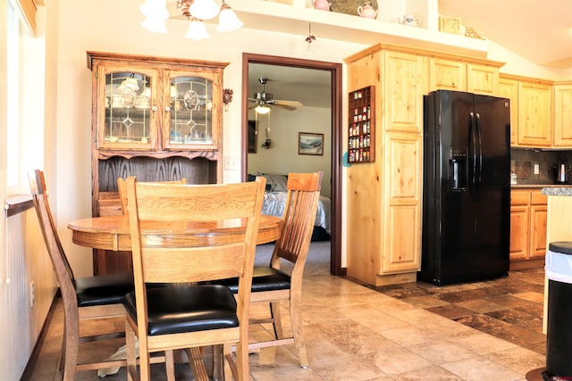 521 Alta Lakes Ave, Montrose, CO 81403 - dining room featuring a chandelier, ceiling fan, and lofted ceiling