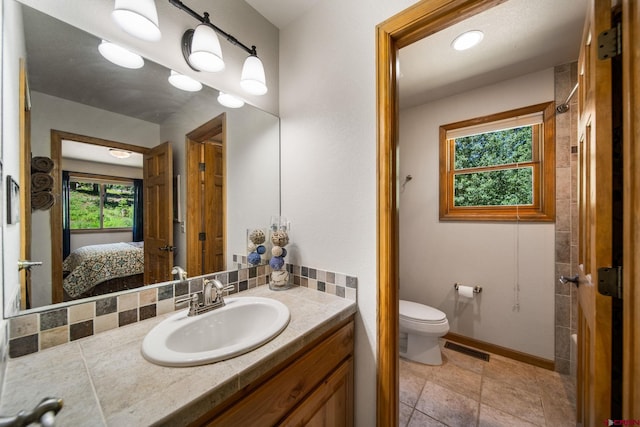 261 Aspen Dr, Durango, CO 81301 - ensuite bathroom featuring vanity and toilet
