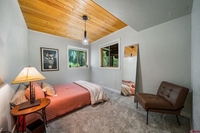 261 Aspen Dr, Durango, CO 81301 - carpeted bedroom featuring wood ceiling and baseboards
