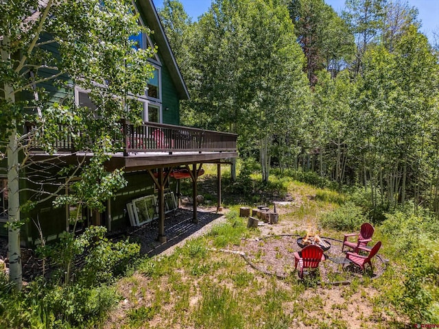 261 Aspen Dr, Durango, CO 81301 - view of yard with a fire pit and a wooden deck