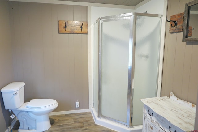 20657 Del Ray Dr, Eckert, CO 81418 - full bath featuring wood finished floors, a shower stall, and wood walls