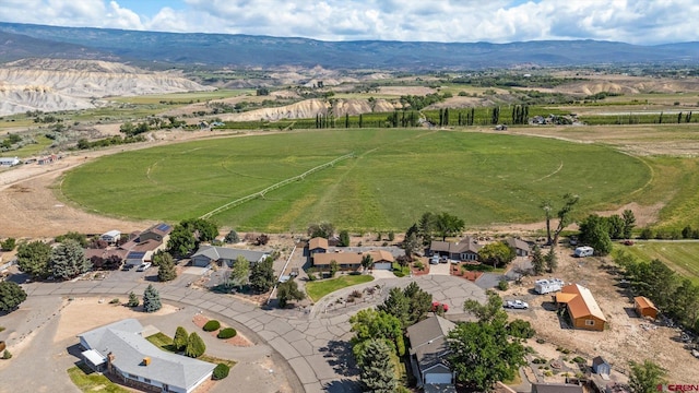 20657 Del Ray Dr, Eckert, CO 81418 - aerial perspective of suburban area featuring a mountainous background