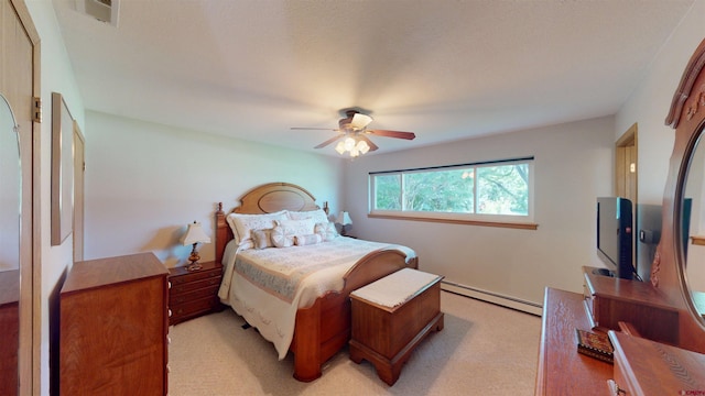 100 Paonia Ave, Paonia, CO 81428 - bedroom with baseboard heating, light colored carpet, and ceiling fan