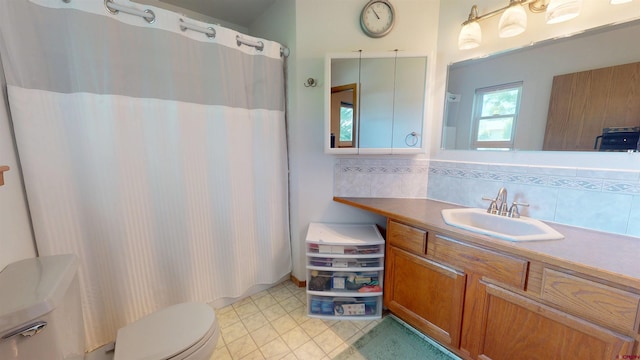 100 Paonia Ave, Paonia, CO 81428 - bathroom featuring vanity, tasteful backsplash, and a shower with shower curtain