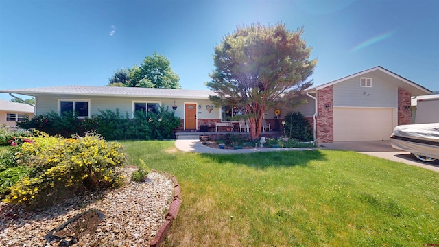 100 Paonia Ave, Paonia, CO 81428 - single story home featuring brick siding, a front lawn, driveway, and a garage
