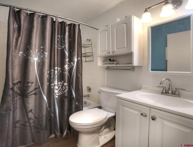2920 Holly Ave Unit 104, Durango, CO 81301 - bathroom featuring vanity, shower / bathtub combination with curtain, and a textured ceiling