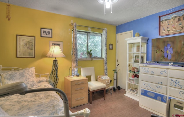 2920 Holly Ave Unit 104, Durango, CO 81301 - bedroom with a textured ceiling and baseboards