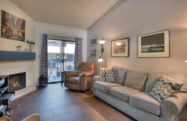 2920 Holly Ave Unit 104, Durango, CO 81301 - living room with a fireplace and high vaulted ceiling