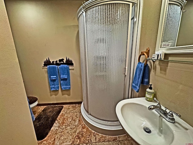 152 Conifer Dr, South Fork, CO 81154 - full bathroom featuring a stall shower and a sink