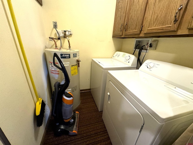 152 Conifer Dr, South Fork, CO 81154 - laundry area with electric water heater, cabinet space, washing machine and dryer, and dark colored carpet