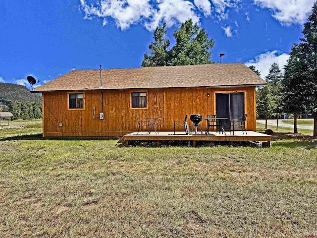 152 Conifer Dr, South Fork, CO 81154 - back of house featuring a wooden deck and a yard