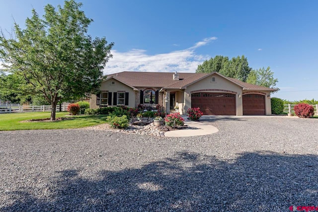 1734 Dry Creek Cir, Delta, CO 81416 - single story home with a garage, driveway, and stucco siding