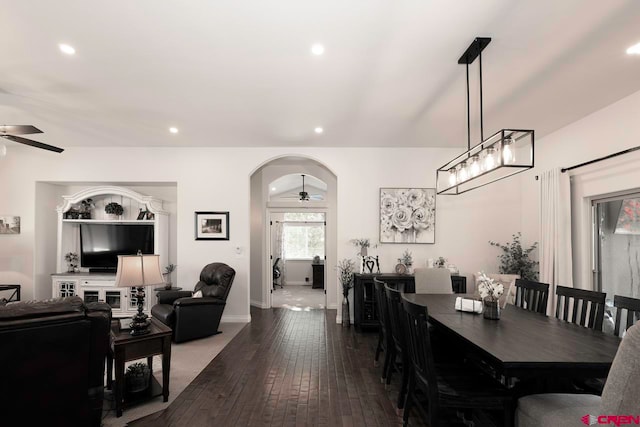 1734 Dry Creek Cir, Delta, CO 81416 - dining space featuring a ceiling fan, recessed lighting, dark wood-style flooring, and arched walkways