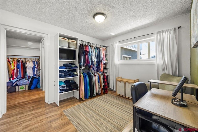 21932 2225th Rd, Cedaredge, CO 81413 - walk in closet featuring wood finished floors