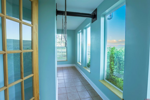 825 County Road 17, Gunnison, CO 81230 - hall featuring tile patterned floors and beamed ceiling