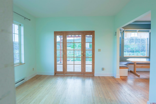 825 County Road 17, Gunnison, CO 81230 - entryway featuring baseboard heating, light wood-style flooring, and healthy amount of natural light