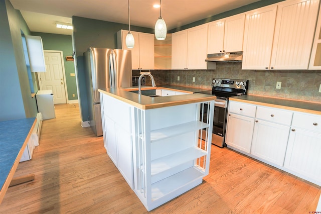 825 County Road 17, Gunnison, CO 81230 - kitchen featuring open shelves, stainless steel appliances, under cabinet range hood, tasteful backsplash, and recessed lighting