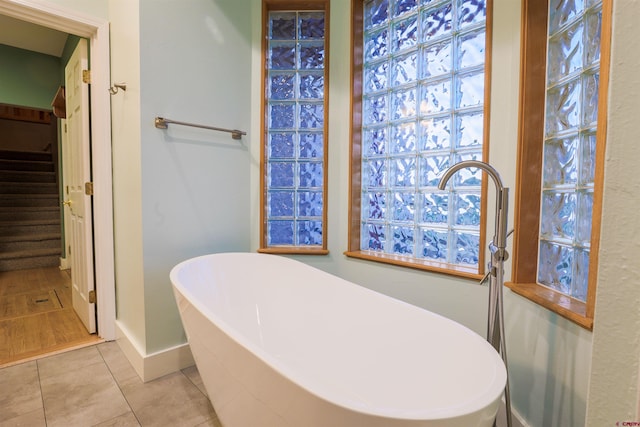 825 County Road 17, Gunnison, CO 81230 - full bath with a freestanding tub and tile patterned flooring