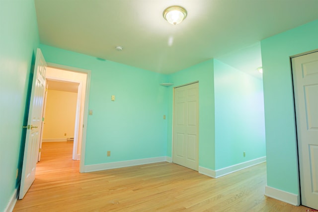 825 County Road 17, Gunnison, CO 81230 - unfurnished bedroom with light wood finished floors and baseboards