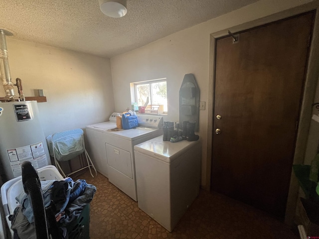 537 N Colorado Ave, Dove Creek, CO 81324 - laundry room with washing machine and clothes dryer, a textured ceiling, and gas water heater
