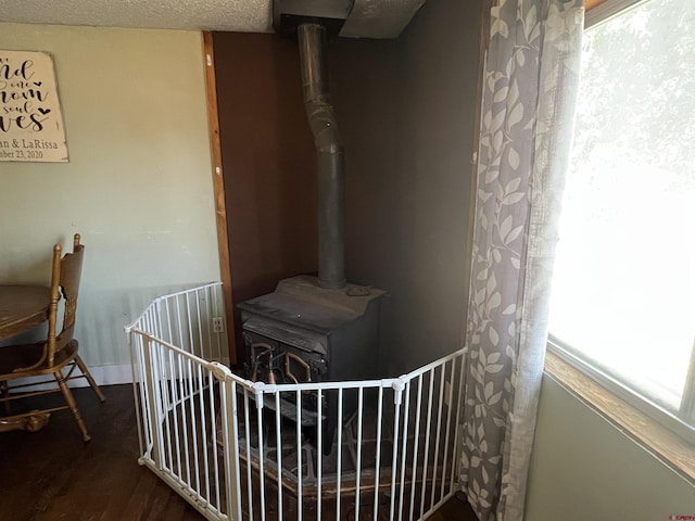 537 N Colorado Ave, Dove Creek, CO 81324 - detailed view of a wood stove and wood finished floors