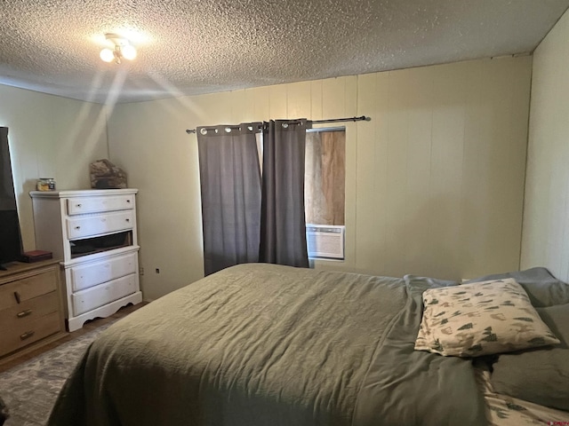537 N Colorado Ave, Dove Creek, CO 81324 - bedroom with a textured ceiling and cooling unit