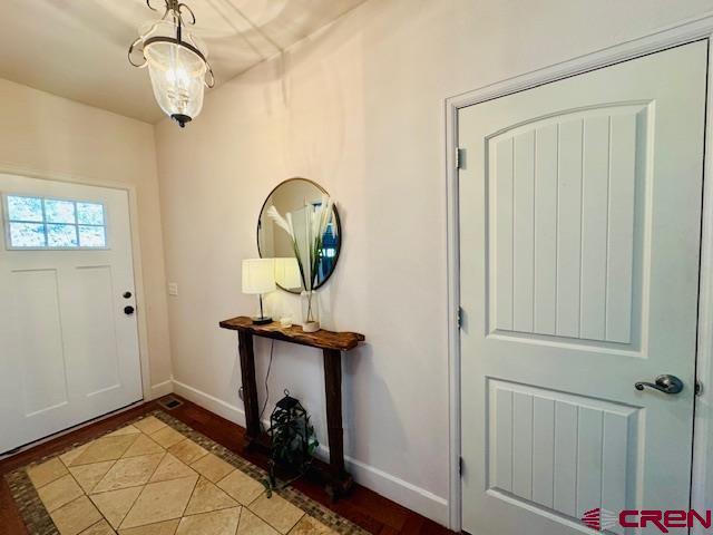 1490 SE Fairway Dr, Cedaredge, CO 81413 - entrance foyer with baseboards