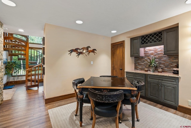 73 S Tamarron Dr Unit 822, Durango, CO 81301 - dining space with light wood-style flooring, stairs, recessed lighting, and bar