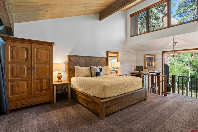 73 S Tamarron Dr Unit 822, Durango, CO 81301 - bedroom with dark carpet, high vaulted ceiling, access to exterior, a chandelier, and wood ceiling