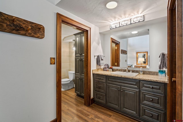 73 S Tamarron Dr Unit 822, Durango, CO 81301 - bathroom featuring vanity and wood finished floors