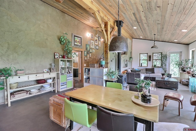16242 Farmers Mine Rd, Paonia, CO 81428 - dining space with finished concrete floors, wooden ceiling, and recessed lighting