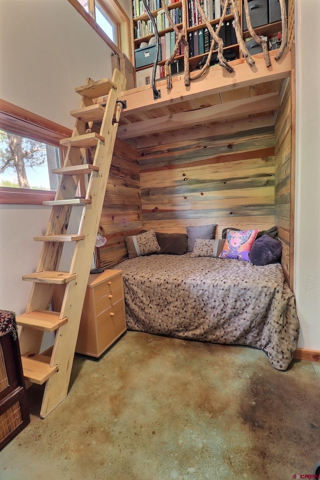 16242 Farmers Mine Rd, Paonia, CO 81428 - bedroom with concrete flooring and wooden walls