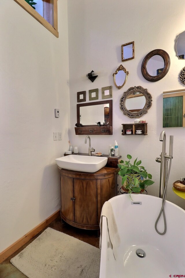 16242 Farmers Mine Rd, Paonia, CO 81428 - bathroom with a soaking tub and vanity