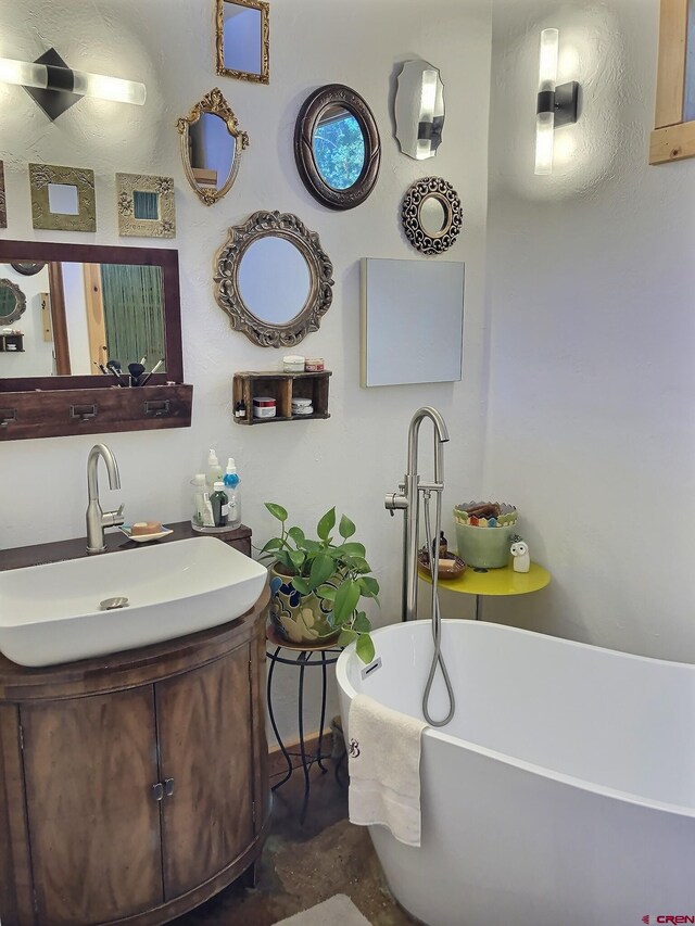 16242 Farmers Mine Rd, Paonia, CO 81428 - bathroom featuring vanity and a freestanding bath