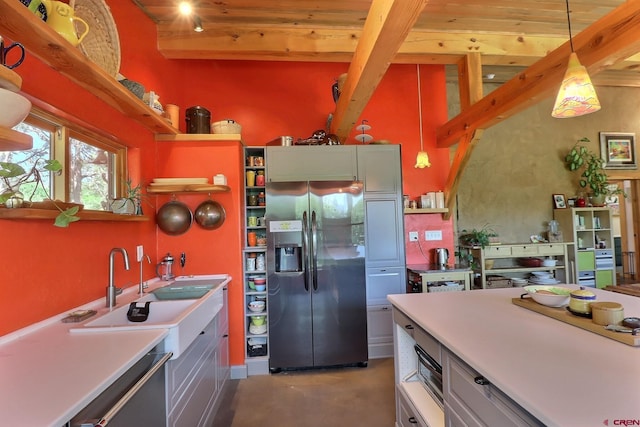 16242 Farmers Mine Rd, Paonia, CO 81428 - kitchen with stainless steel appliances, concrete flooring, open shelves, hanging light fixtures, and a wood ceiling with exposed beams