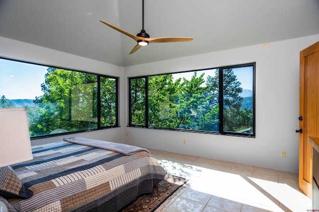 570 Jenkins Ranch Rd, Durango, CO 81301 - bedroom with tile patterned flooring, lofted ceiling, and a ceiling fan