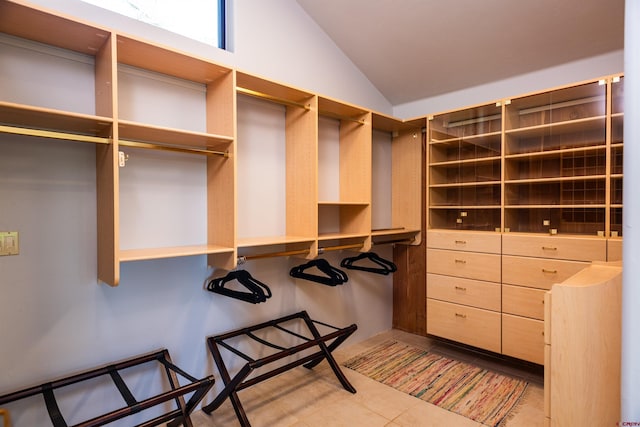 570 Jenkins Ranch Rd, Durango, CO 81301 - walk in closet featuring lofted ceiling and light tile patterned flooring