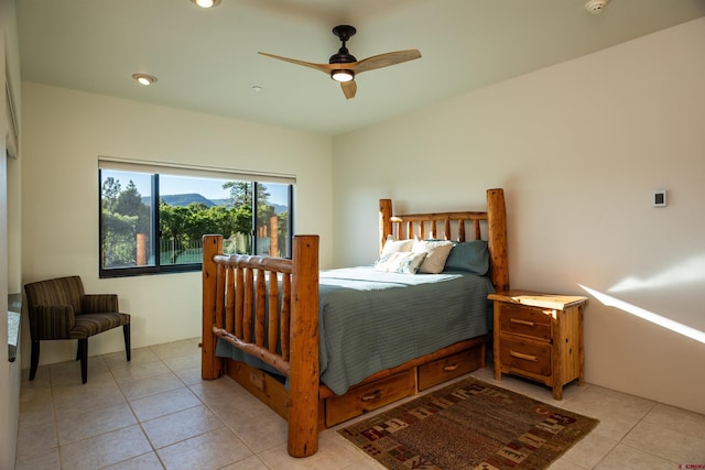 570 Jenkins Ranch Rd, Durango, CO 81301 - bedroom featuring light tile patterned flooring and a ceiling fan