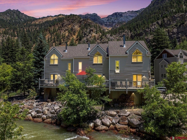 1254 Champ Ln, Ouray, CO 81427 - rear view of property with a deck with mountain view
