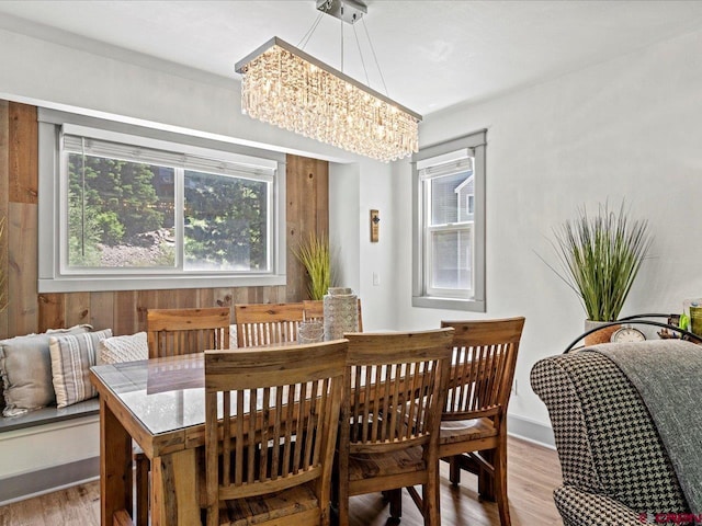 1254 Champ Ln, Ouray, CO 81427 - dining room with a chandelier, healthy amount of natural light, and wood finished floors