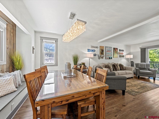 1254 Champ Ln, Ouray, CO 81427 - dining space with wood finished floors, a chandelier, and beam ceiling