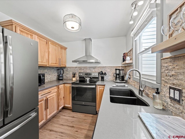 1254 Champ Ln, Ouray, CO 81427 - kitchen with freestanding refrigerator, electric range oven, wall chimney exhaust hood, light brown cabinets, and tasteful backsplash