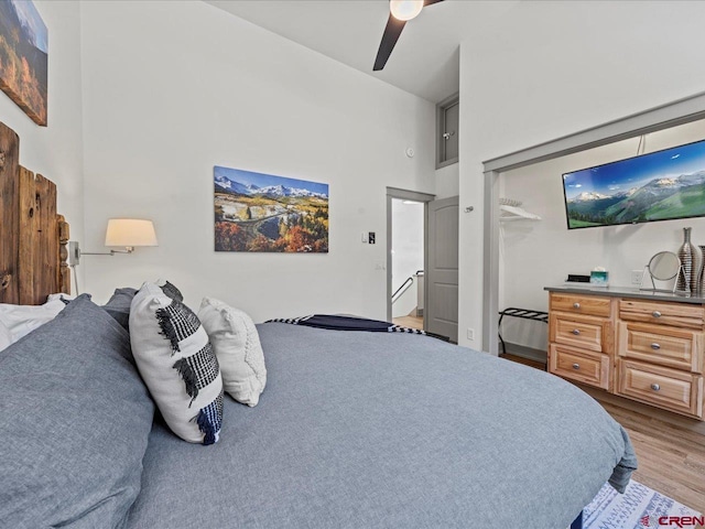 1254 Champ Ln, Ouray, CO 81427 - bedroom with wood finished floors, a high ceiling, and ceiling fan