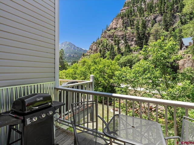 1254 Champ Ln, Ouray, CO 81427 - wooden deck with grilling area and a mountain view