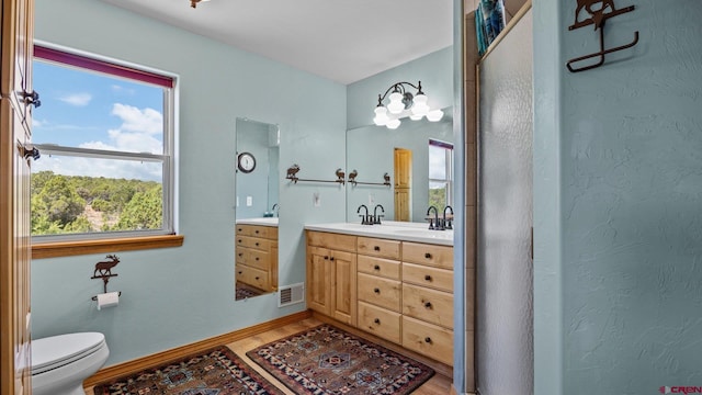 61850 V62 Trl, Montrose, CO 81403 - bathroom featuring double vanity and wood finished floors
