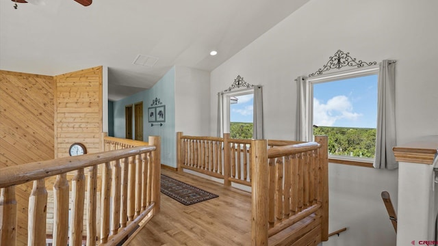 61850 V62 Trl, Montrose, CO 81403 - hall featuring an upstairs landing, wood finished floors, healthy amount of natural light, lofted ceiling, and recessed lighting