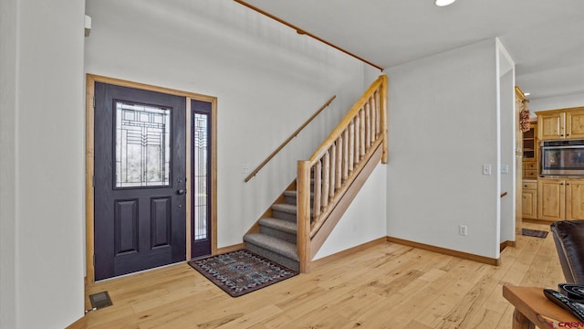 61850 V62 Trl, Montrose, CO 81403 - foyer featuring light wood-type flooring, stairs, and recessed lighting