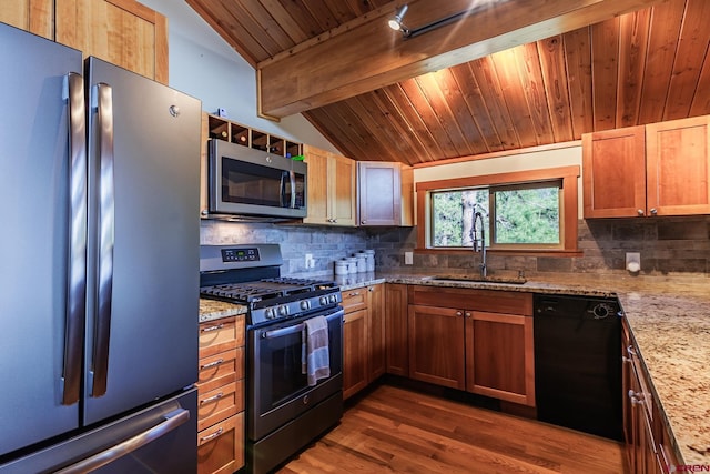 9 Los Ranchitos Dr, Durango, CO 81301 - kitchen featuring freestanding refrigerator, gas stove, dishwasher, stainless steel microwave, and tasteful backsplash