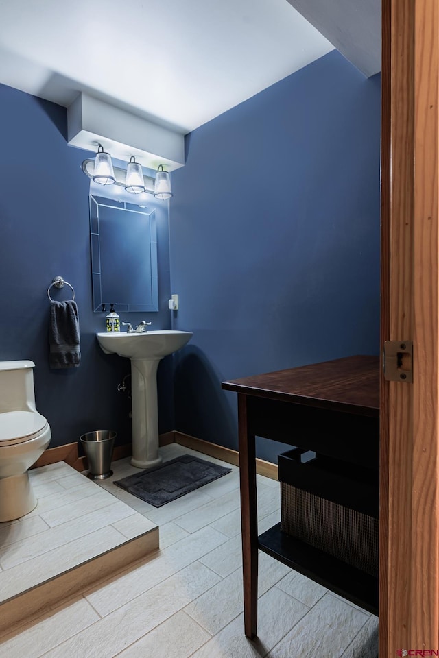 9 Los Ranchitos Dr, Durango, CO 81301 - bathroom with toilet and wood finished floors